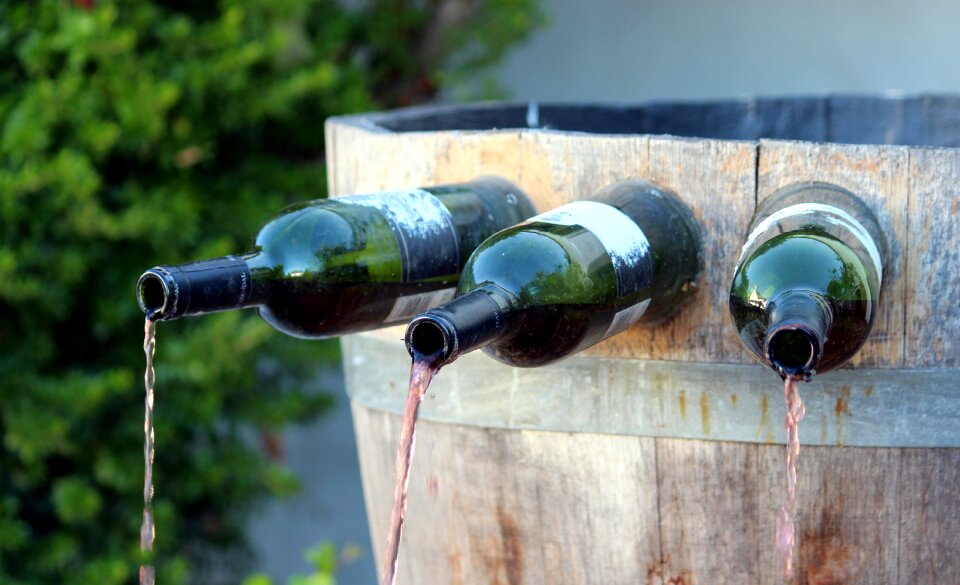 Red wine coloured water flow