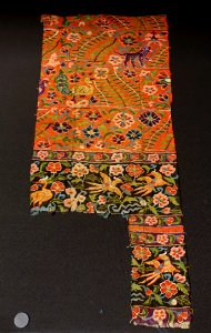 Kesi fragment with flowering plant, bird, and best design on red, purple, and black bands, China, Yuan dynasty, 1200s-1300s AD, textile - Tokyo National Museum - Tokyo, Japan - DSC08437