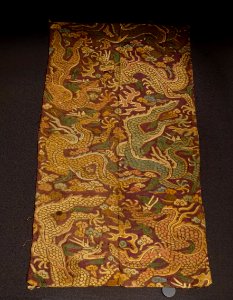 Kesi fragment with dragon design on purple ground, China, Yuan dynasty, 1200s-1300s AD, textile - Tokyo National Museum - Tokyo, Japan - DSC08441