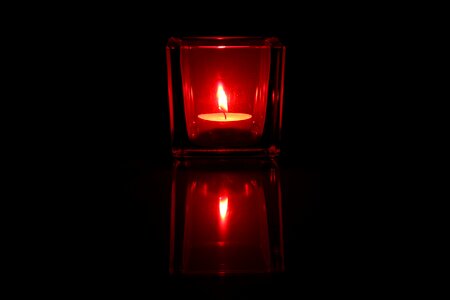 Shining candlelight reflexes photo