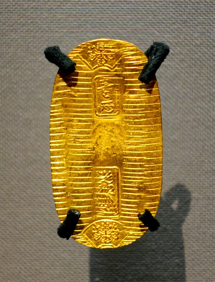 Keicho-koban coin, escavated at Ginza 6cho-me, Chuo-ku, Tokyo, Azuchi-Momoyama to Edo period, 1500s-1600s AD, gold - Tokyo National Museum - Ueno Park, Tokyo, Japan - DSC09275