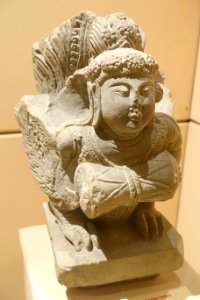 Kinnara (celestial singer), architectural element, view 2, Phat Tich pagoda, Bac Ninh, Ly dynasty, 1057 AD, carved stone - National Museum of Vietnamese History - Hanoi, Vietnam - DSC05542