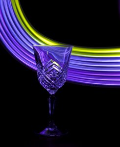 Light painting black wine black glass photo