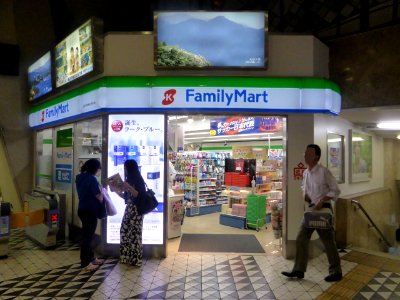 Kintetsu eki fami out of the ticket gate on the griund of Nagoya station store