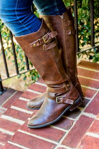Teen woman riding boots photo