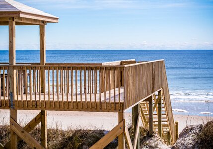 Beach house sand water photo