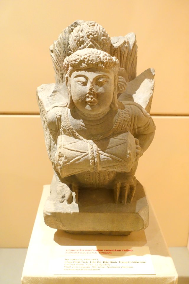 Kinnara (celestial singer), architectural element, view 1, Phat Tich pagoda, Bac Ninh, Ly dynasty, 1057 AD, carved stone - National Museum of Vietnamese History - Hanoi, Vietnam - DSC05541