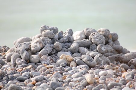 Round stone pebble coast photo
