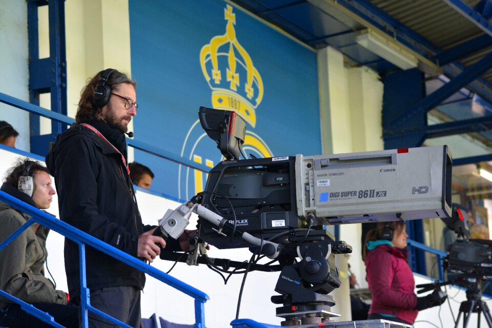 People filming man