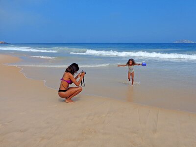 Young mother beach ipanema photo