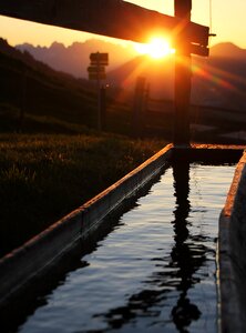 Alpine fountain sun