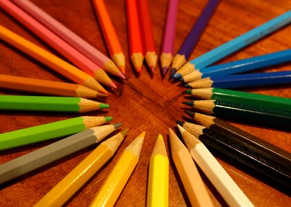 Pointed draw different colored crayons photo