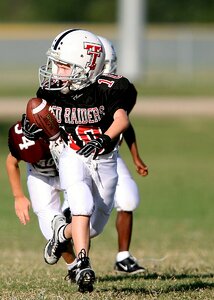Ball carrier youth league athlete photo