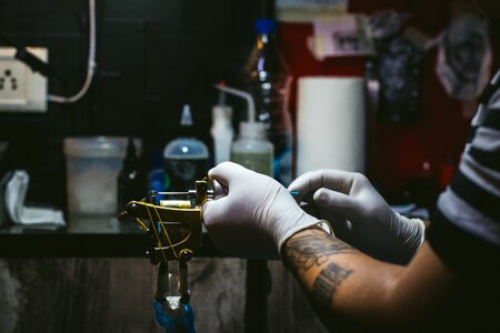 Tattooist tattooing machine