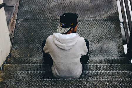 Person sitting staircase