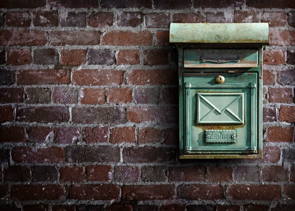 Letter boxes stone wall weathered