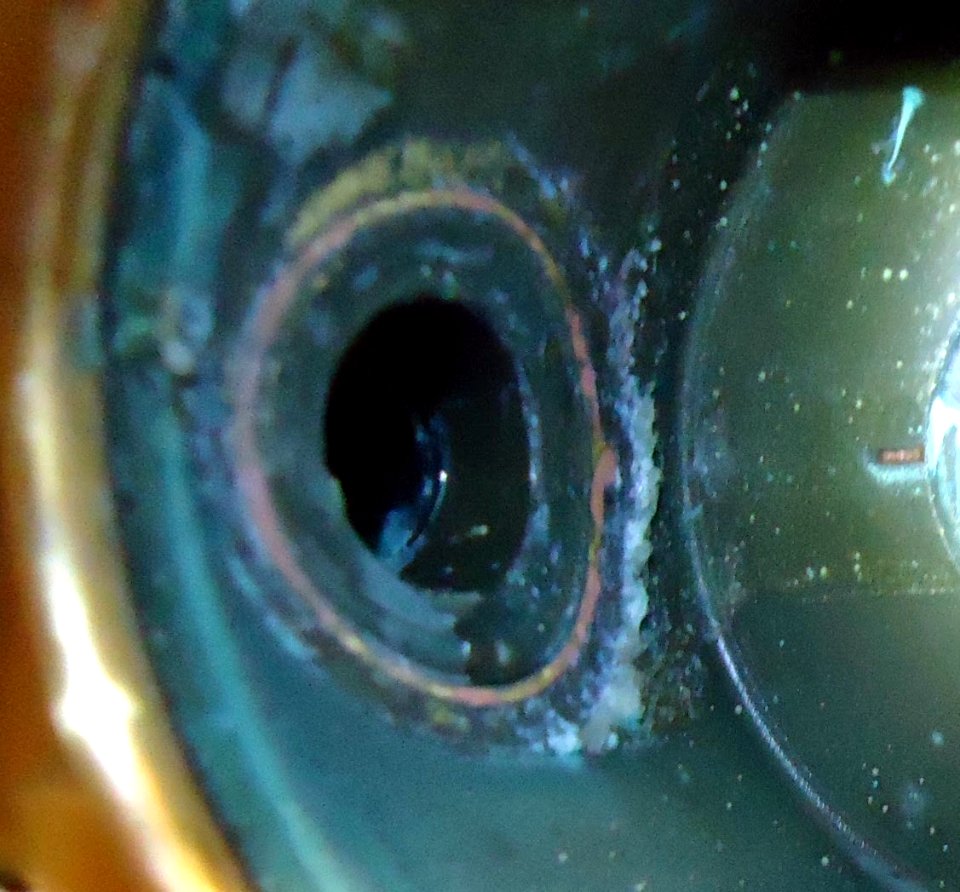 Kohler shower valve replacement buildup on chamber visible was scraped away