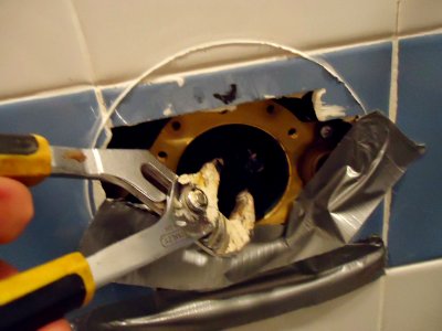 Kohler shower valve replacement using pliers to remove defective diverter valve