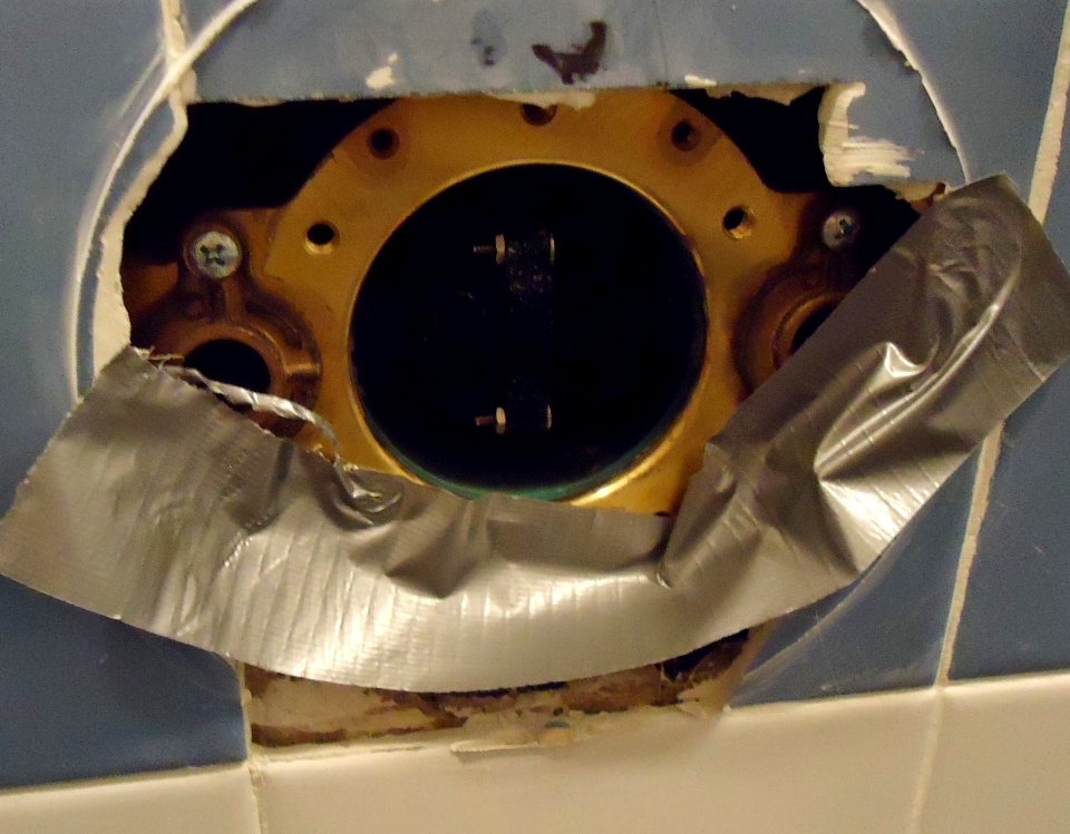 Kohler shower valve replacement tape to prevent screws from being lost inside the wall