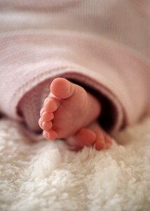 Baby feet newborn child photo