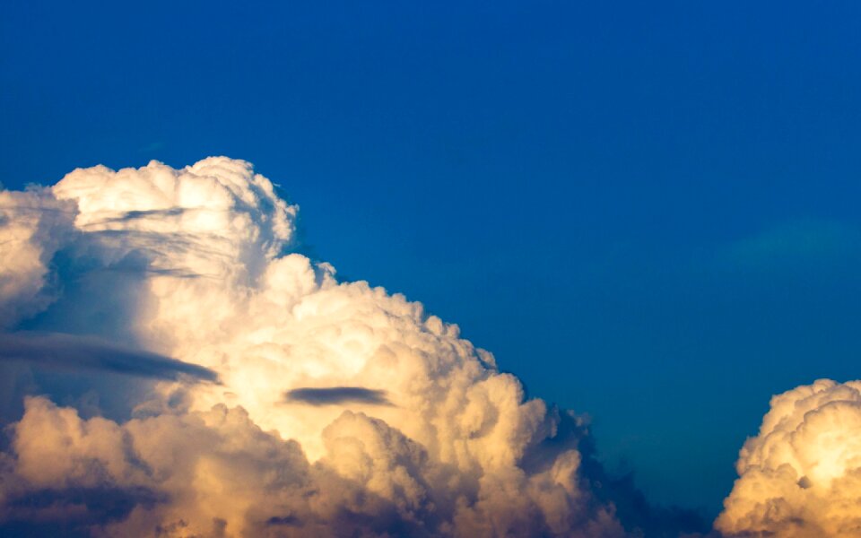 Dark blue the clouds yellow