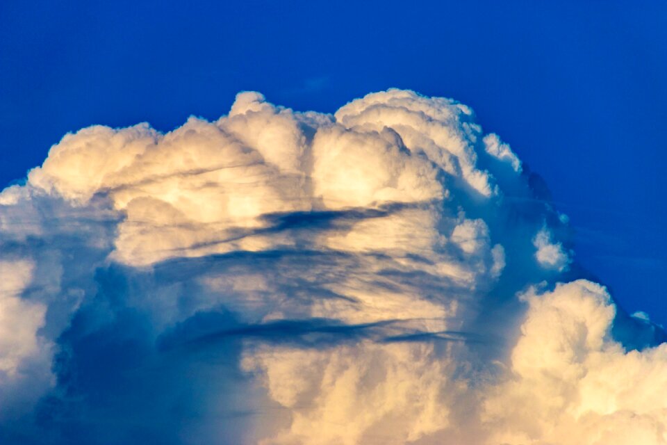 Dark blue the clouds yellow