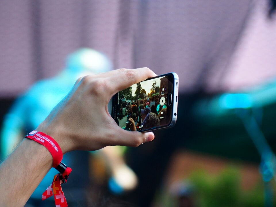 Man recording smartphone