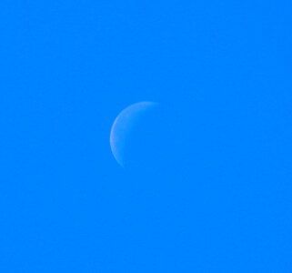 Daytime moon moon blue sky photo