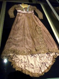 Late afternoon dress by Jean-Philippe Worth, view 1, France, Paris, c. 1905, silk satin weighted with tin salts, gilded net - Royal Ontario Museum - DSC04406 photo