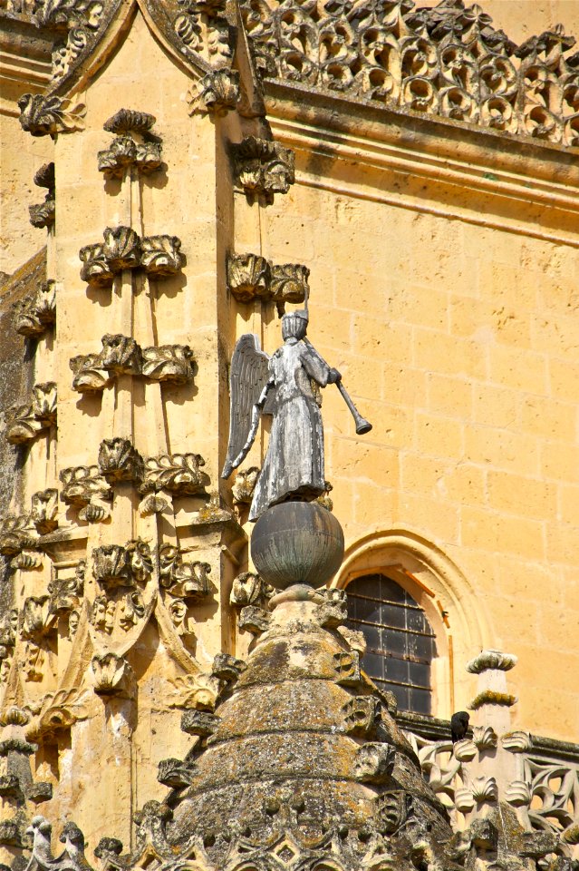 Lead angel playing trumpet cathedral Segovia Spain