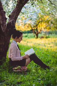 Person reading woman