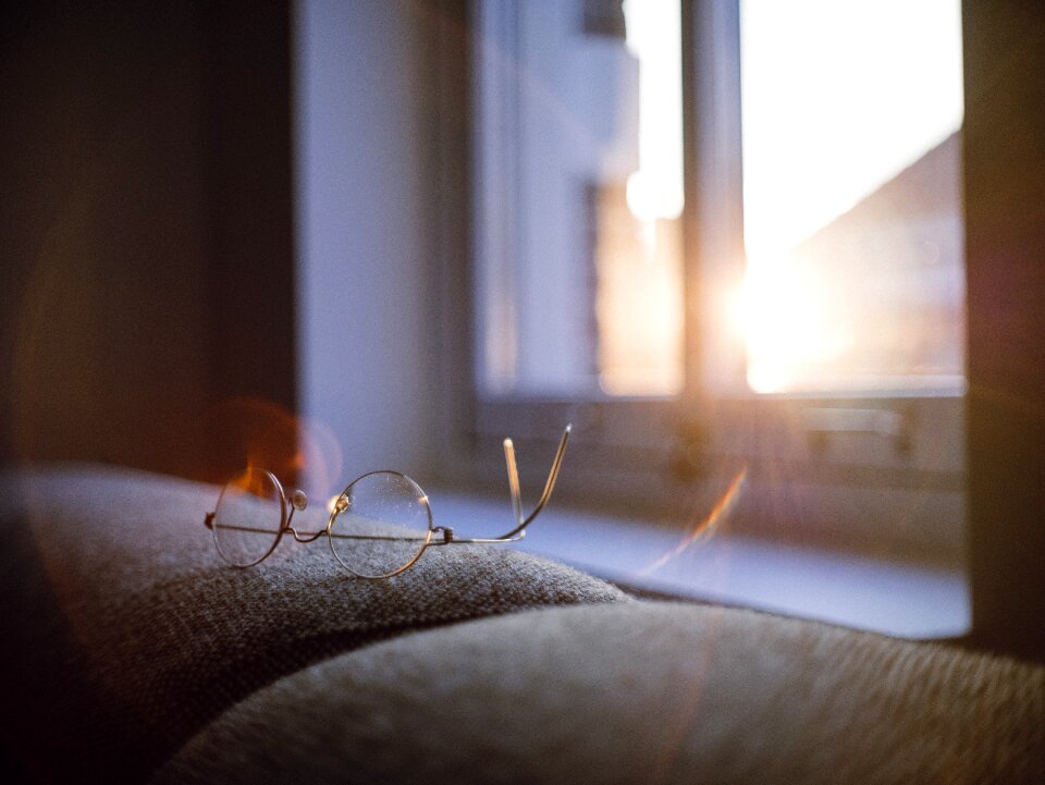 Reading glasses sun glare window