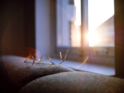 Reading glasses sun glare window photo