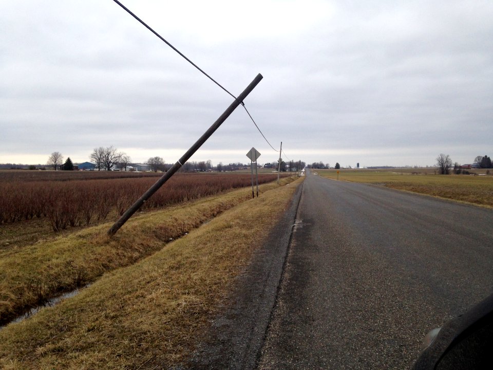 Leaning pylon soggy ground wind