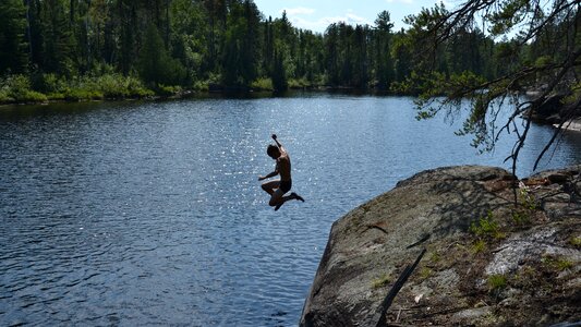 Person jumping cliff