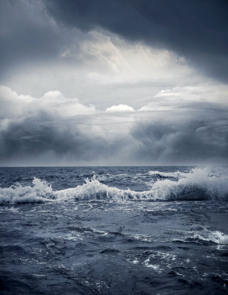 Dark clouds stormy sky waves