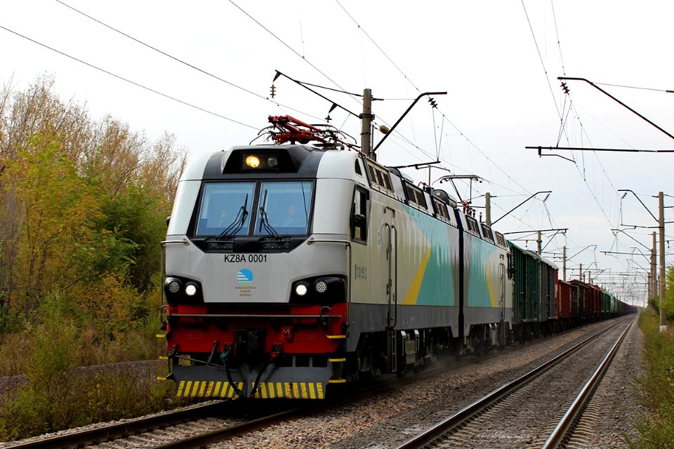 KZ8A-0001 with freight train