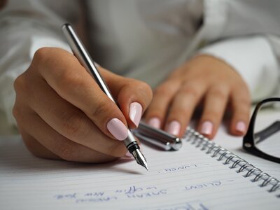 Handwriting nails notebook photo