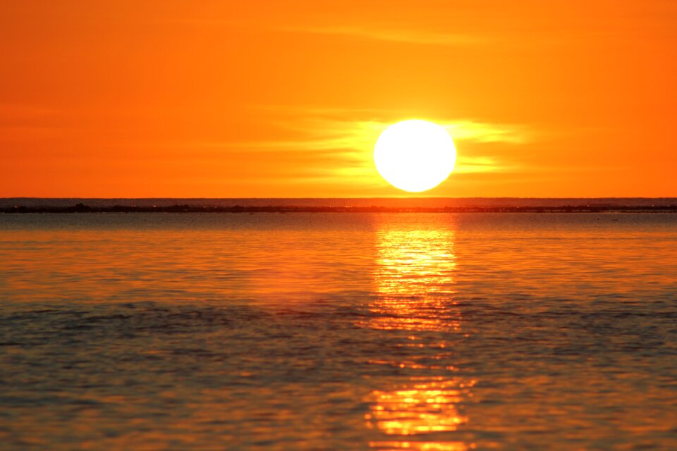 Sunset reflection sea photo