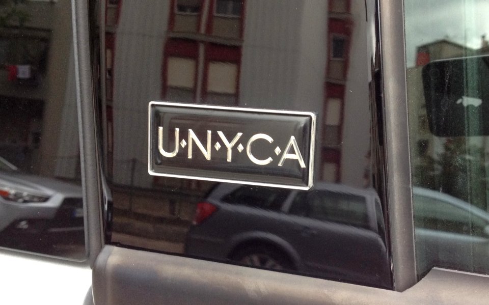 Lancia Ypsilon Unyca badge