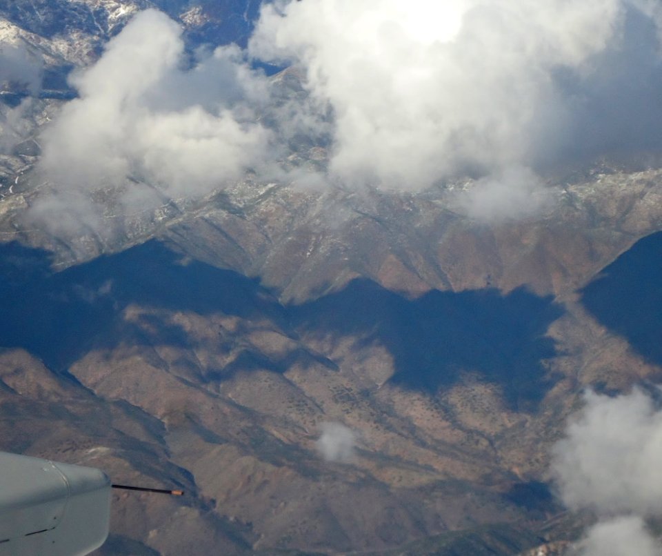 Lake in Rocky Mountains from airplane 38000 feet up