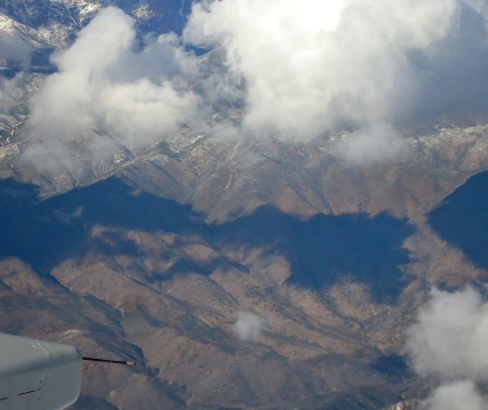 Lake in Rocky Mountains from airplane 38000 feet up photo