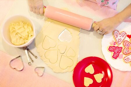 Heart-shaped cookies dough rolling pin photo