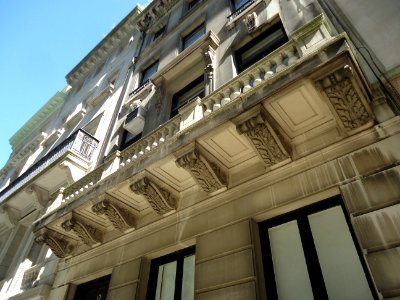 Looking up at building and balcony in NYC showing design