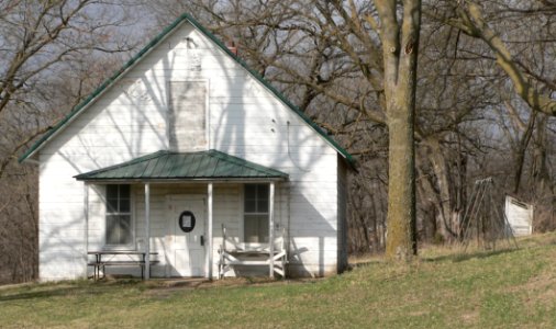 Long Creek School and outhouse from E