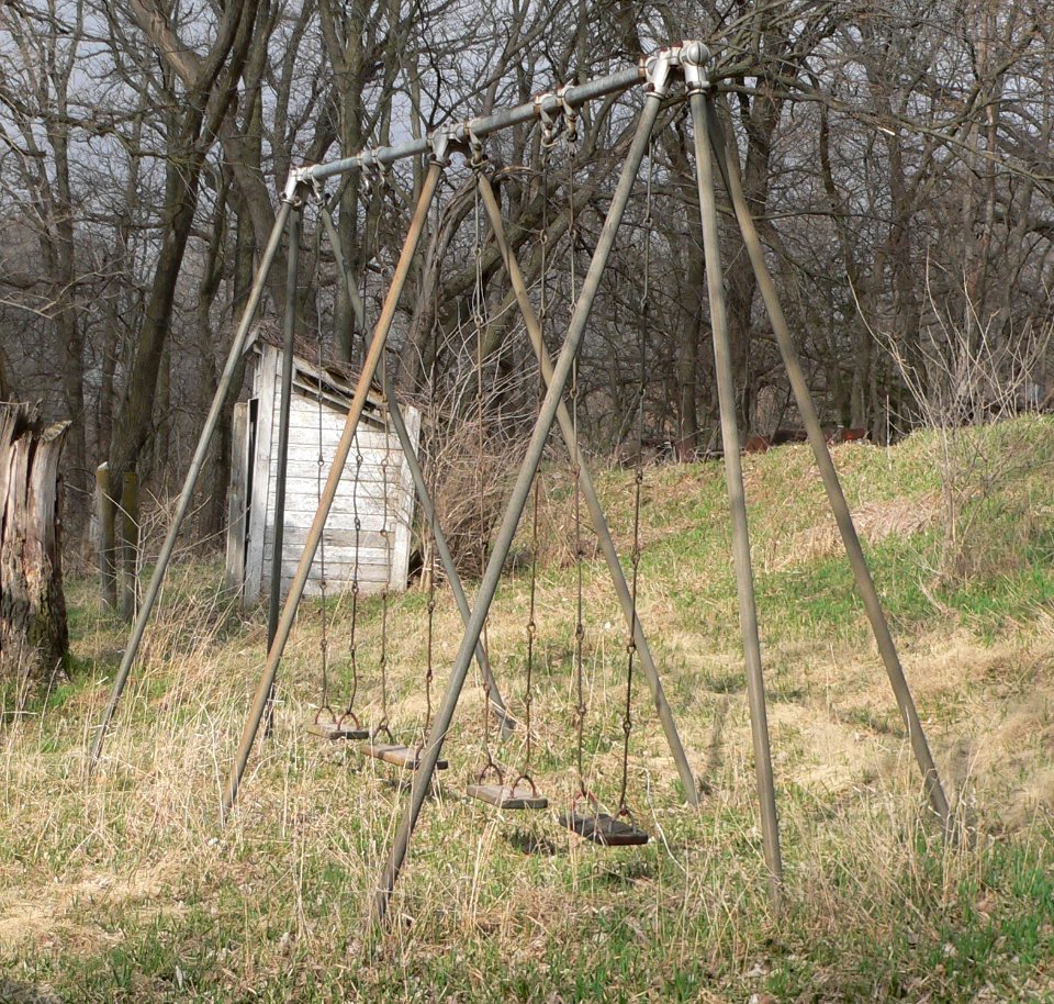 Long Creek School swings and outhouse