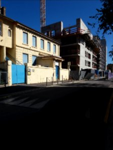 Lyon 7e - Rue André Bollier, immeuble en construction à côté de l'école Le Petit Monde