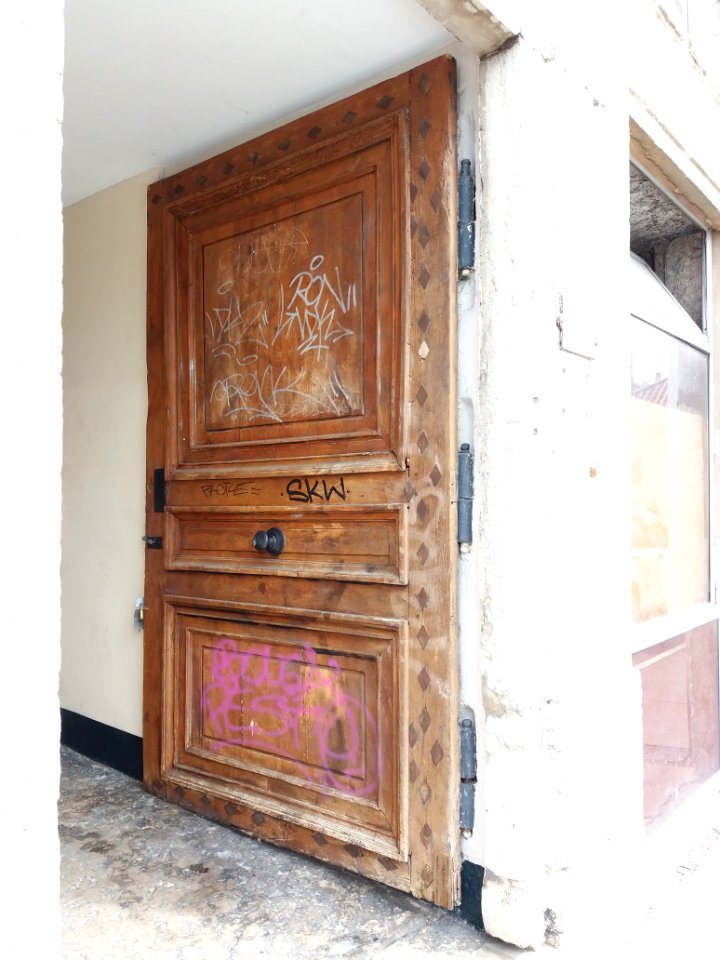 Lyon 1er - Place Rouville, porte de la maison Brunet