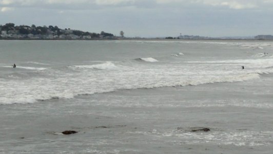 Lynn Massachusetts view of surfers in Atlantic Ocean looking southeast