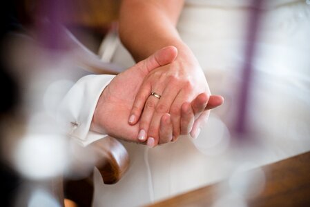 Hands bride and groom rings photo